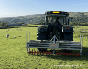 tractor implementing soil aeration