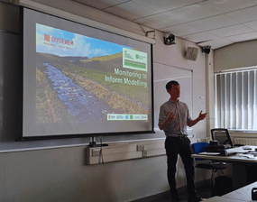 Adam Johnston presenting at the University of Manchester